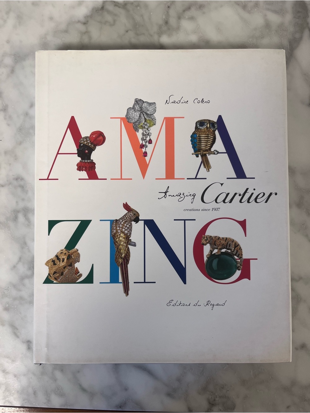 Cartier Hardcover Book — White Cover with Multicolored Lettering